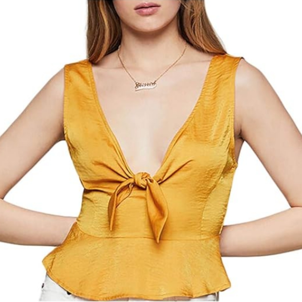 BCBGeneration gold peplum tank size small